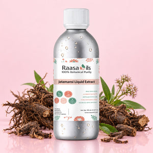 A bottle of Raasa oils Jatamansi Liquid Extract centered on a pink background, flanked by dried roots and green leaves. The bottle is metallic silver with a white cap and a white label featuring botanical illustrations.