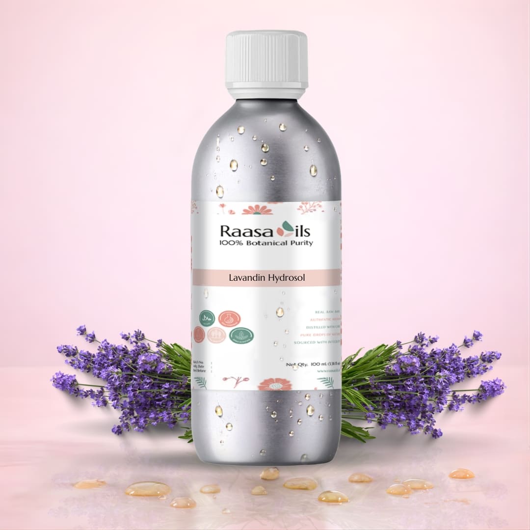 Raasa Oils bottle with lavender flowers on a pink background