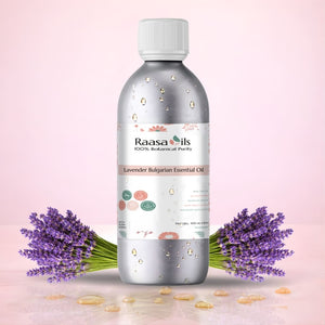 Raasa Oils lavender Bulgarian essential oil bottle with lavender flowers on a pink background