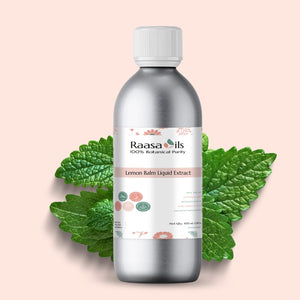 Bottle of Raasa Oils Lemon Balm Liquid Extract with lemon balm leaves on a light pink background