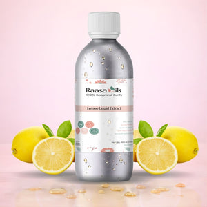 Bottle of Raasa Oils Lemon Liquid Extract with lemons on a pink background