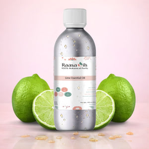 Raasa Oils lime essential oil bottle with limes on a pink background