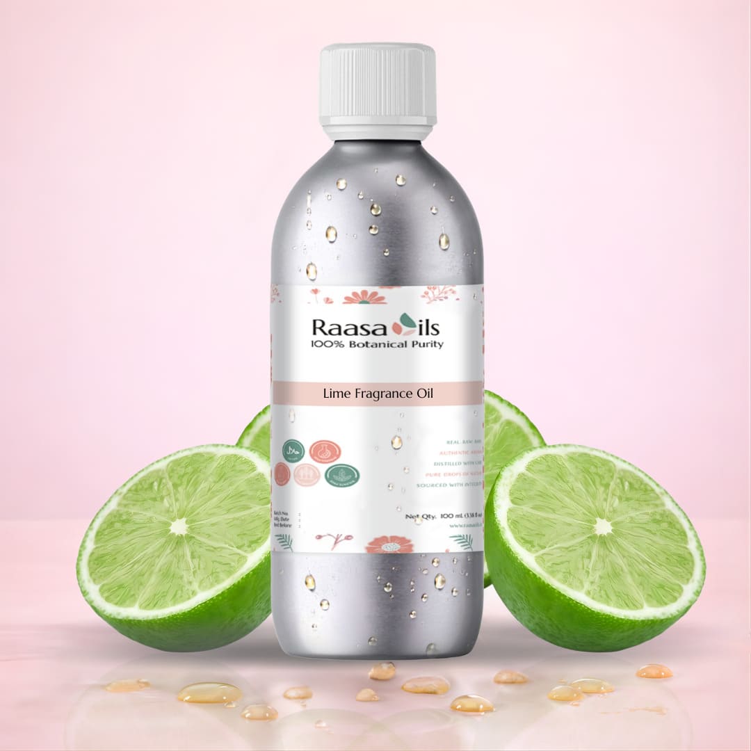 Bottle of Raasa Oils Lime Fragrance Oil with lime slices on a pink background
