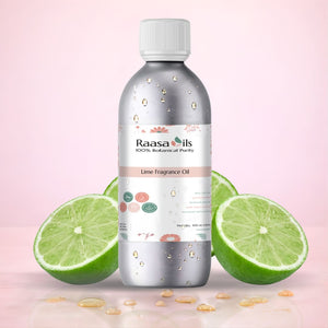 Bottle of Raasa Oils Lime Fragrance Oil with lime slices on a pink background