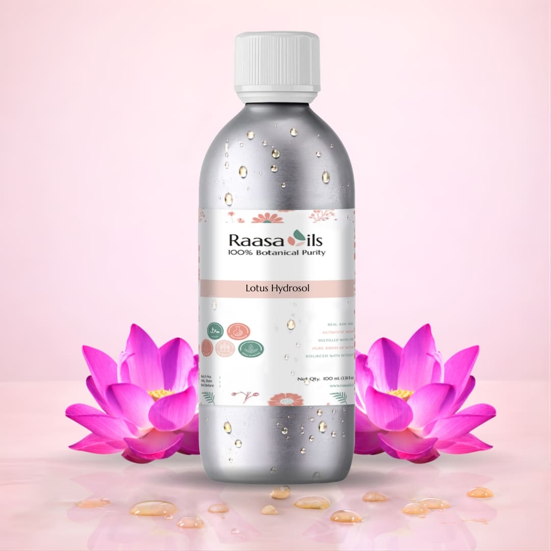 Raasa Oils bottle with pink lotus flowers on a light pink background