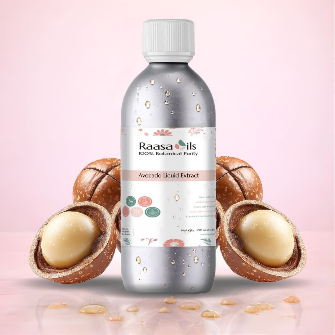 Bottle of Raasa Oils Avocado Liquid Extract with two halves of an avocado on a pink background
