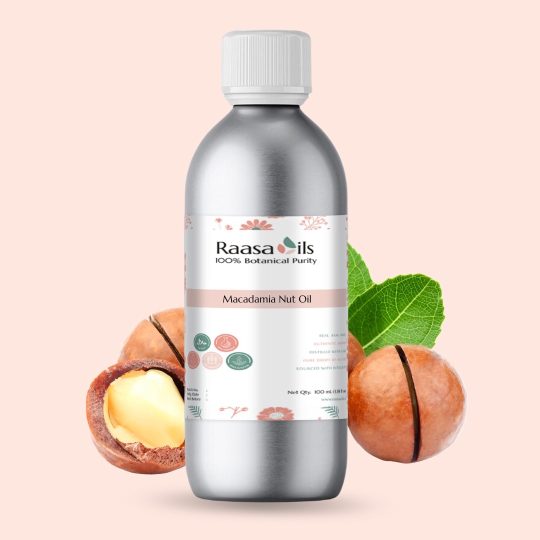 Bottle of Raasa Oils Macadamia Nut Oil with macadamia nuts and leaves on a light pink background