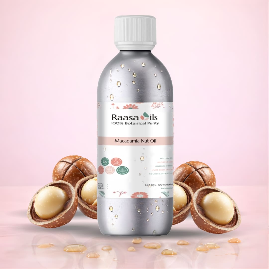 Bottle of Raasa Oils Macadamia Nut Oil with macadamia nuts on a pink background