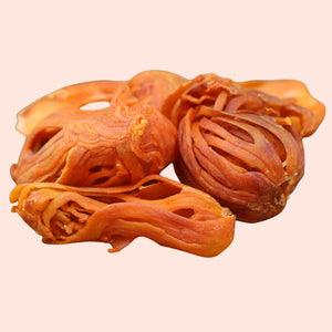 Dried mushrooms on a beige background