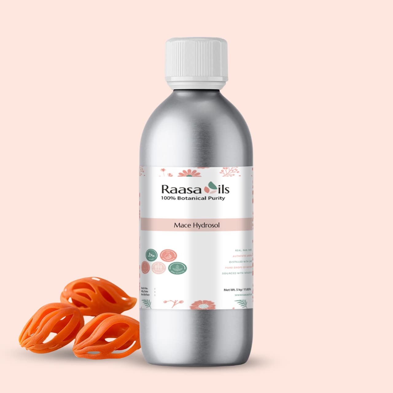 Bottle of Raasa Oils Mace Hydrosol with mace fruits on a beige background