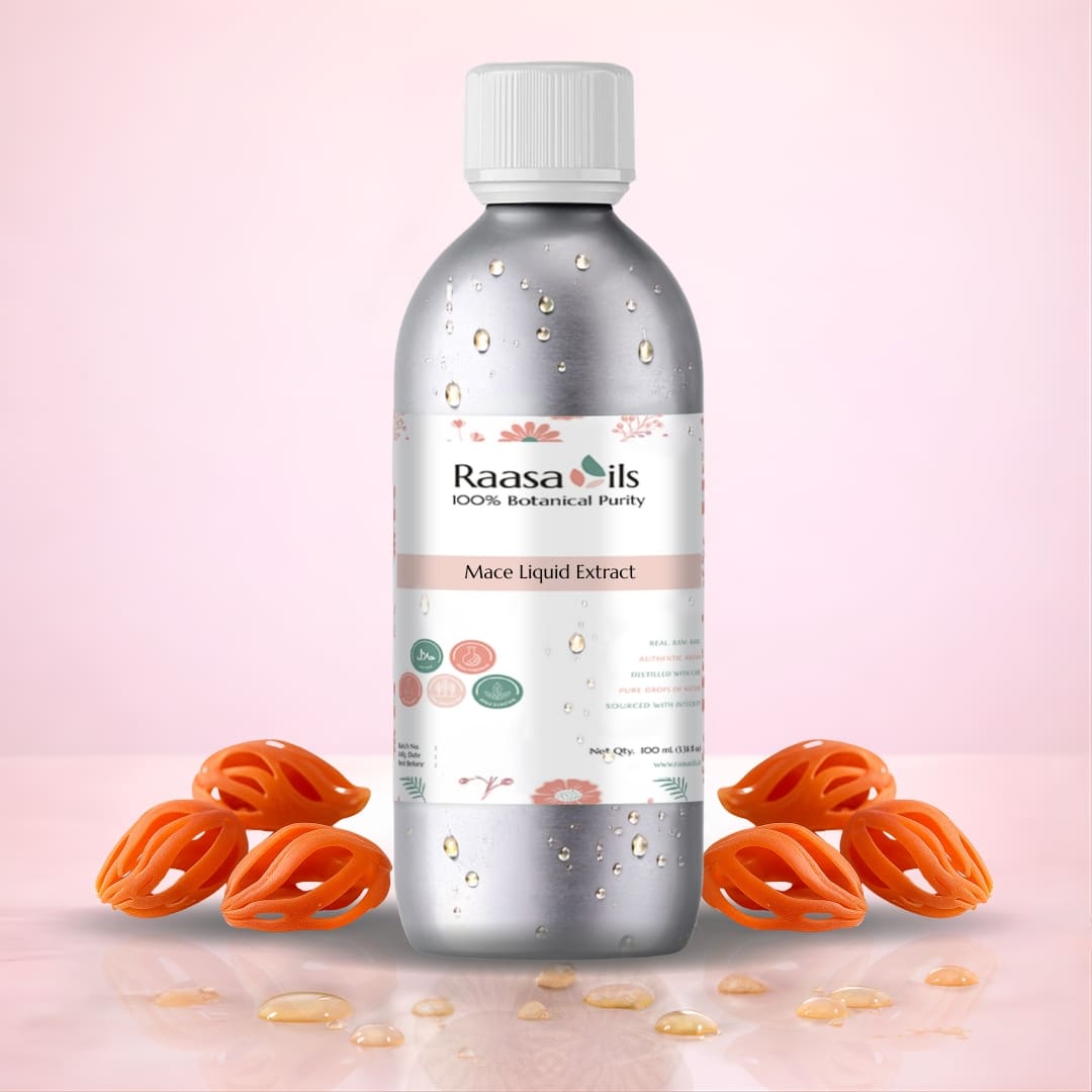 Bottle of Raasa Oils Mace Liquid Extract with mace fruits on a pink background