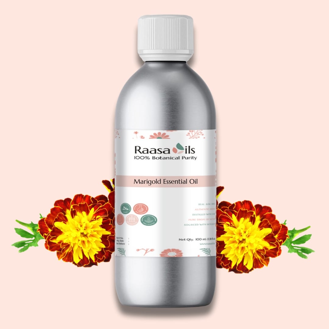Raasa Oils Marigold Essential Oil bottle with marigold flowers on a pink background