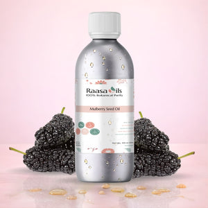 Bottle of Raasa Oils Mulberry Seed Oil with mulberries on a pink background