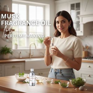 Woman holding a bottle of Musk Fragrance Oil in a kitchen setting