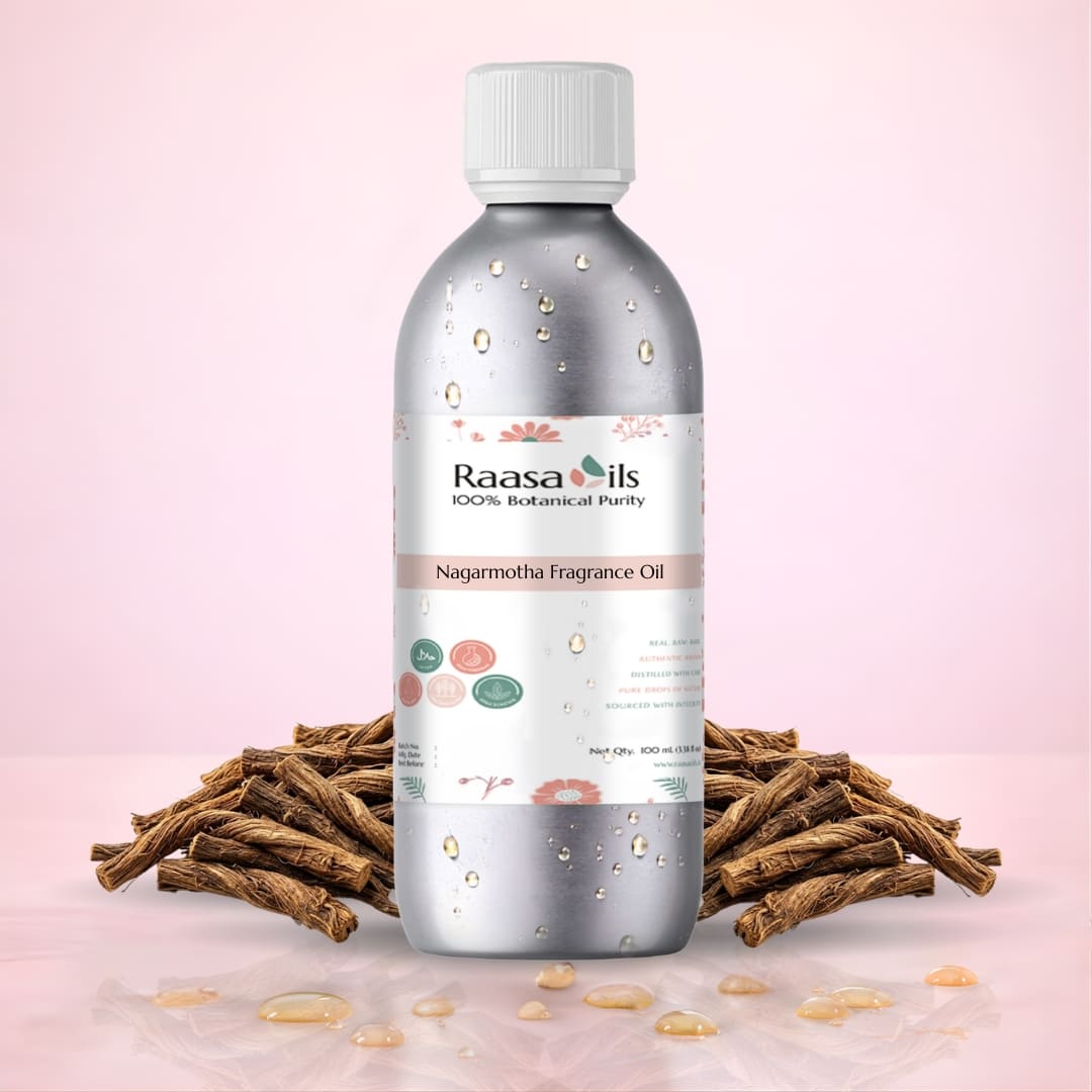 Raasa Oils Nagarmotha Fragrance Oil bottle with dried roots on a pink background