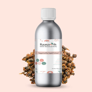 Bottle of Raasa Oils Nagarmotha Liquid Extract with dried herbs on a light pink background