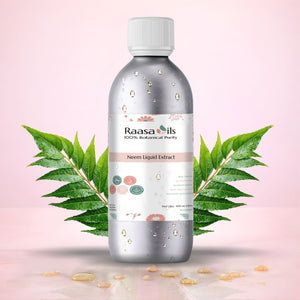 Bottle of Raasa Oils Neem Liquid Extract with neem leaves on a pink background