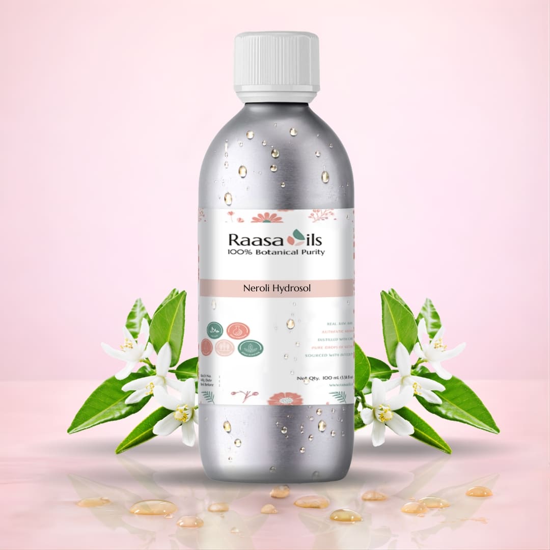 Raasa Oils Neroli Hydrosol bottle with floral elements on a pink background