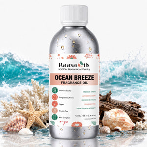 Bottle of Raasa Oils Ocean Breeze Fragrance Oil on a pink background