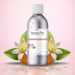 Bottle of Raasa Oils Orange Blossom Liquid Extract with flowers and leaves on a pink background