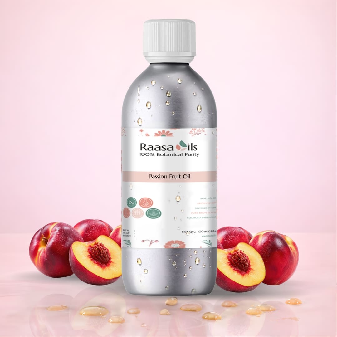 Bottle of Raasa Oils Passion Fruit Oil with passion fruits and leaves on a pink background