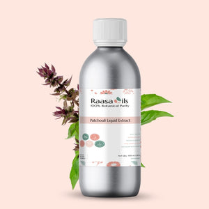 Bottle of Raasa Oils Patchouli Liquid Extract with botanical elements on a light pink background