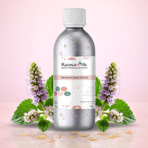 Bottle of Raasa Oils Patchouli Liquid Extract with herbs on a pink background
