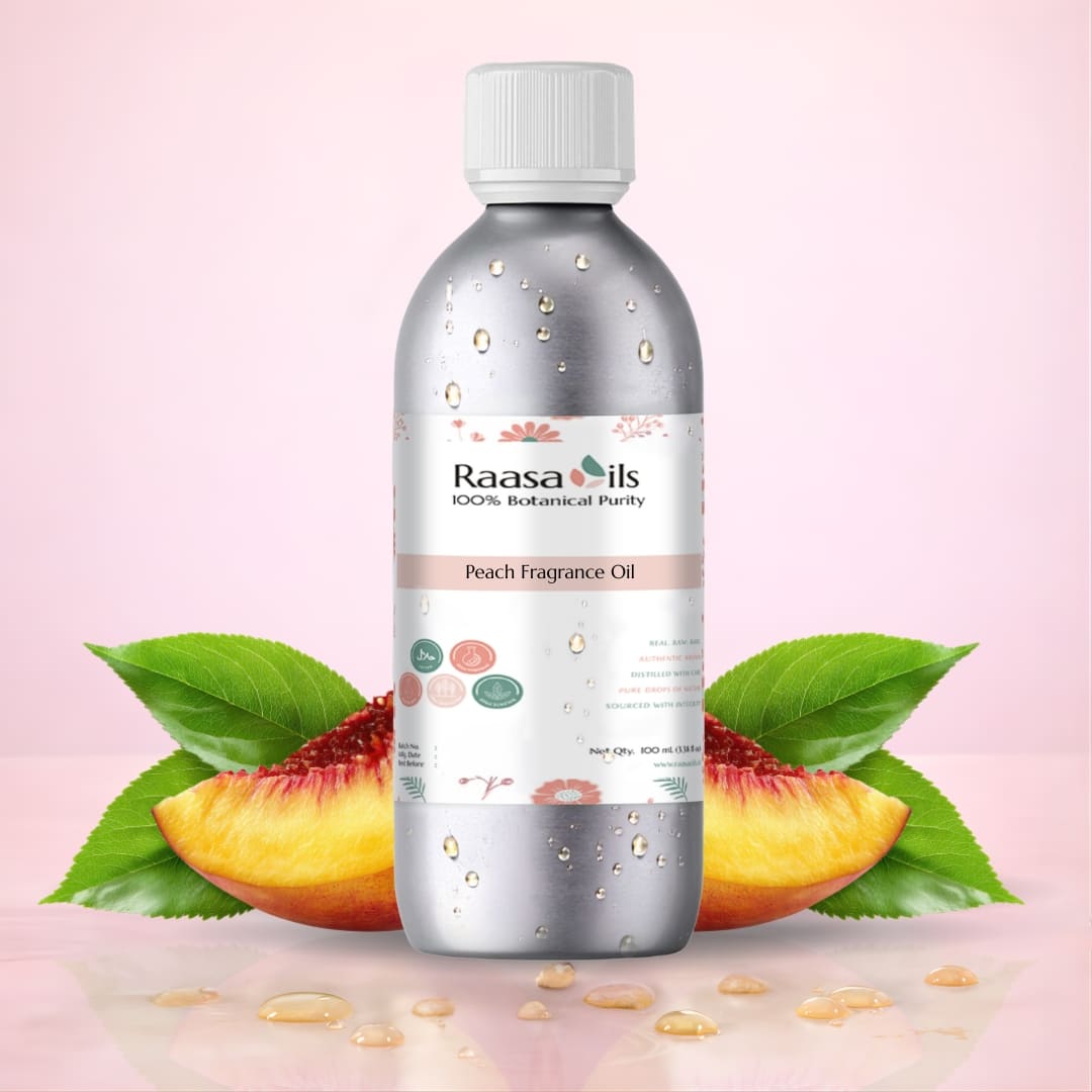 Raasa Oils peach fragrance oil bottle with peach slices and leaves on a pink background