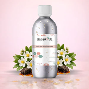 Raasa Oils Peru Balsam Essential Oil bottle with flowers on a pink background