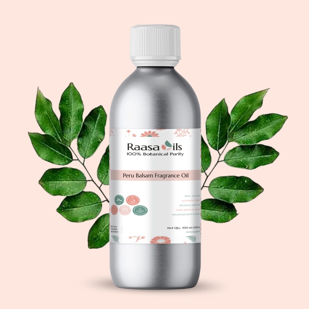 Bottle of Raasa Oils Peru Balm Fragrance Oil with green leaves on a beige background