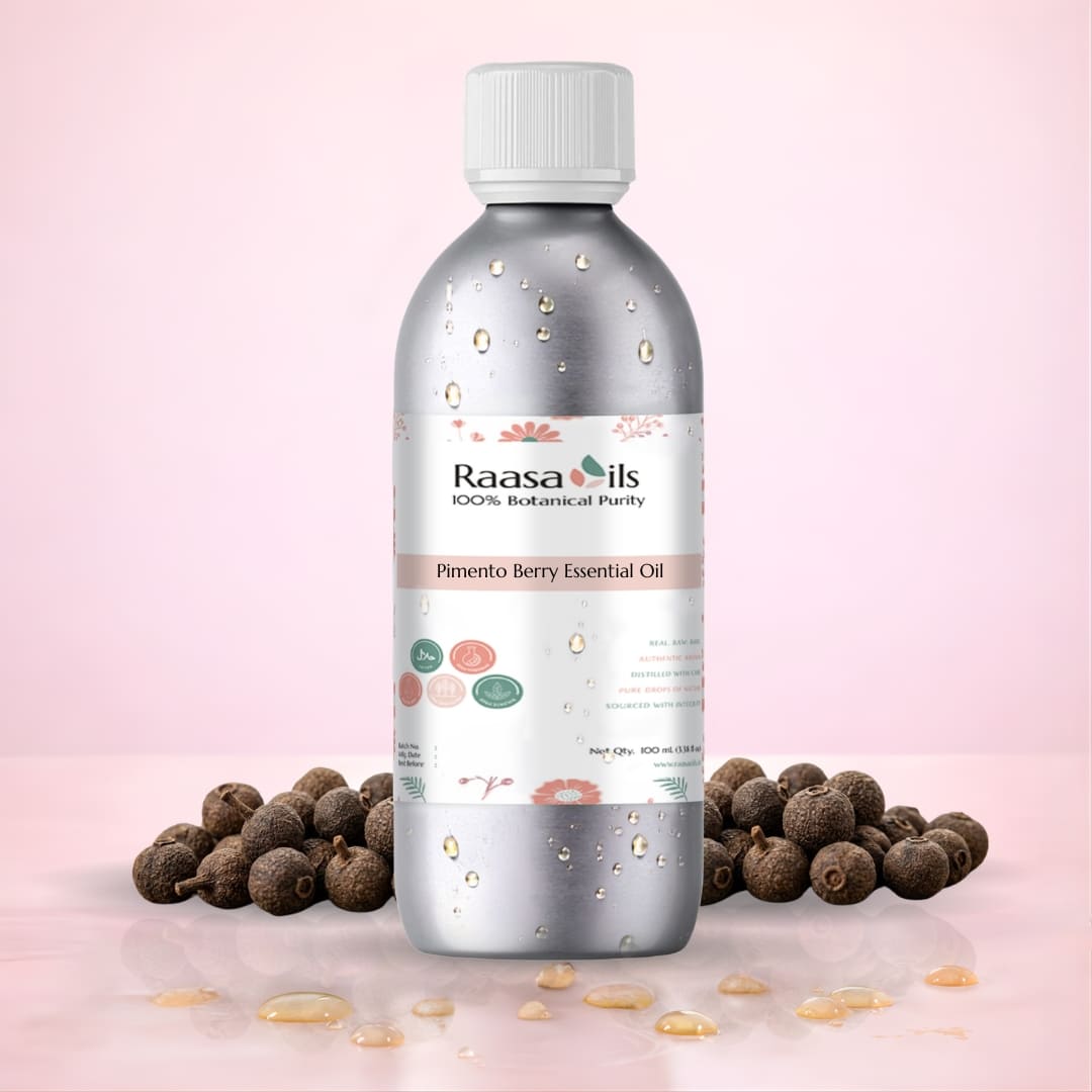 Bottle of Raasa Oils Pimento Berry Essential Oil with pimento berries on a light pink background