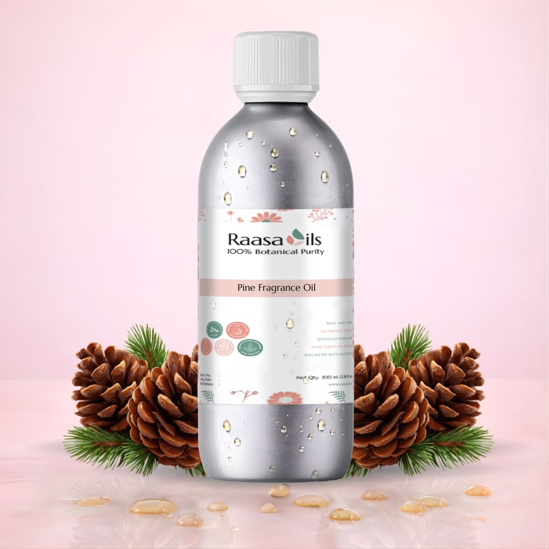 Raasa Oils Pine Fragrance Oil bottle with pine cones and leaves on a pink background