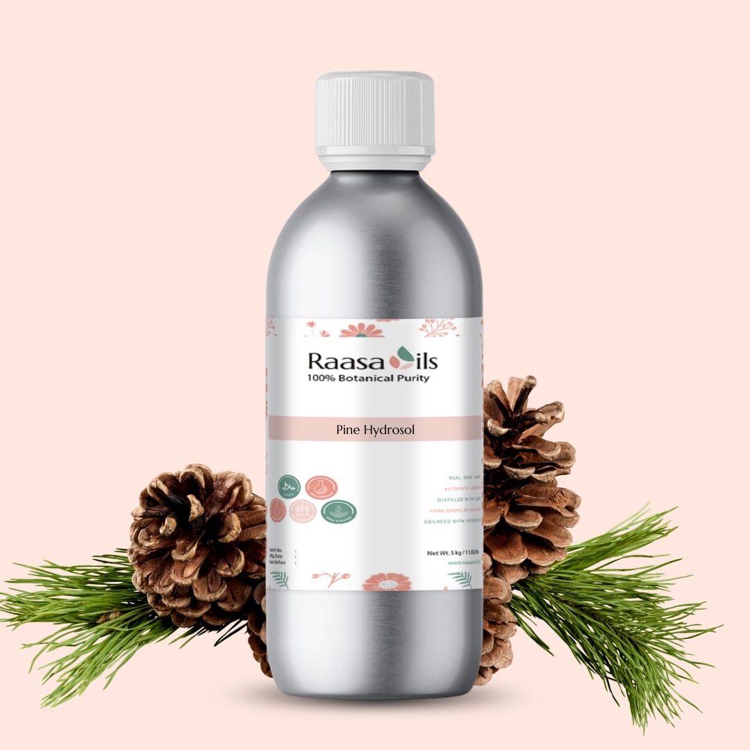 Bottle of Raasa Oils Pine Hydrosol with pine cones and branches on a beige background