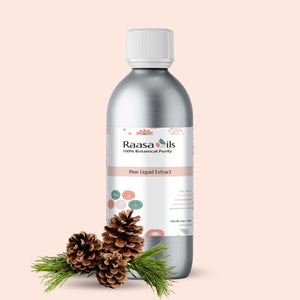 Bottle of Raasa Oils Pine Liquid Extract with pine cones and a branch on a beige background