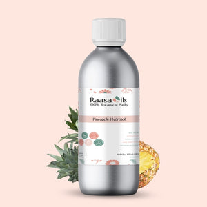 Bottle of Raasa Oils Pineapple Hydrosol with a pink background