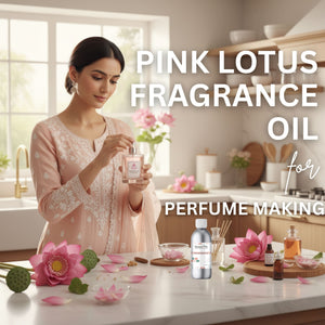 Woman holding a bottle of pink lotus fragrance oil in a kitchen setting with pink lotus flowers and other ingredients.