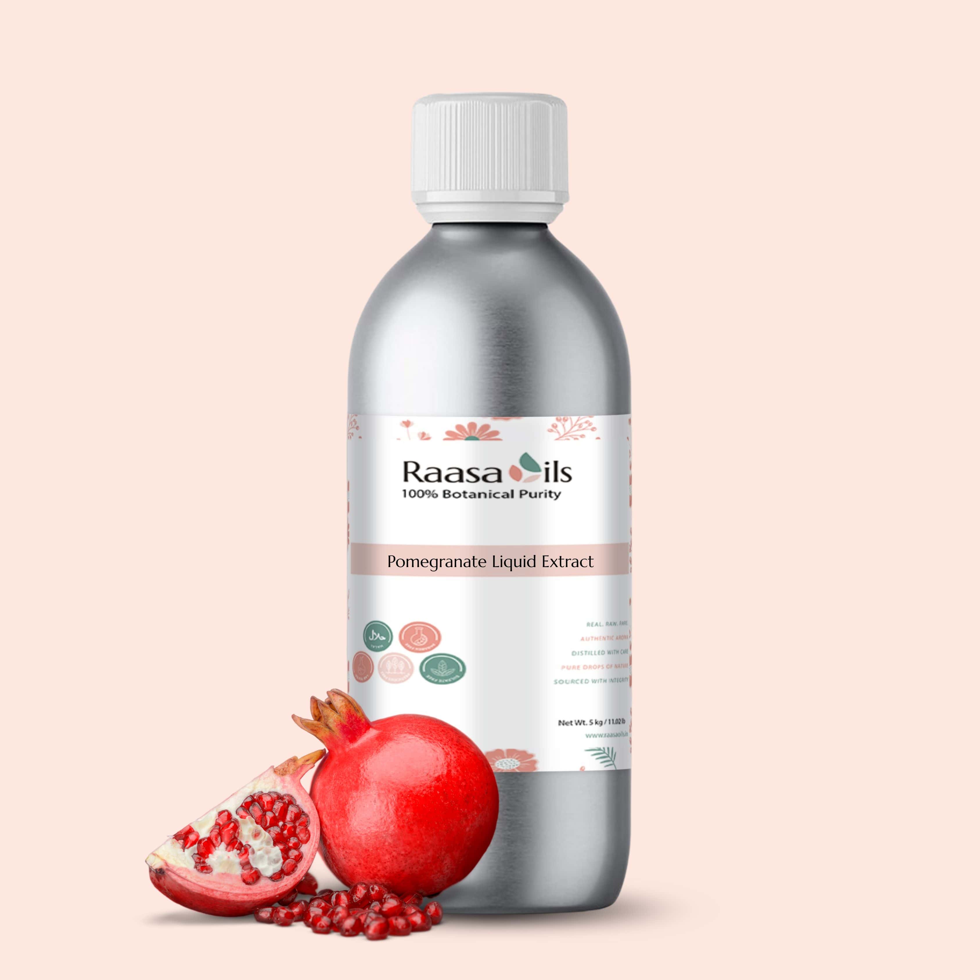 Bottle of Raasa Oils Pomegranate Liquid Extract with pomegranate fruit on a beige background