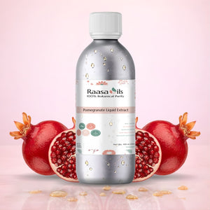 Bottle of Raasa Oils Pomegranate Liquid Extract with pomegranates on a pink background