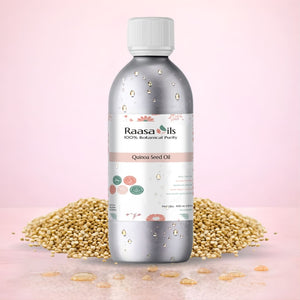 Bottle of Raasa Oils Quinoa Seed Oil with quinoa seeds on a pink background