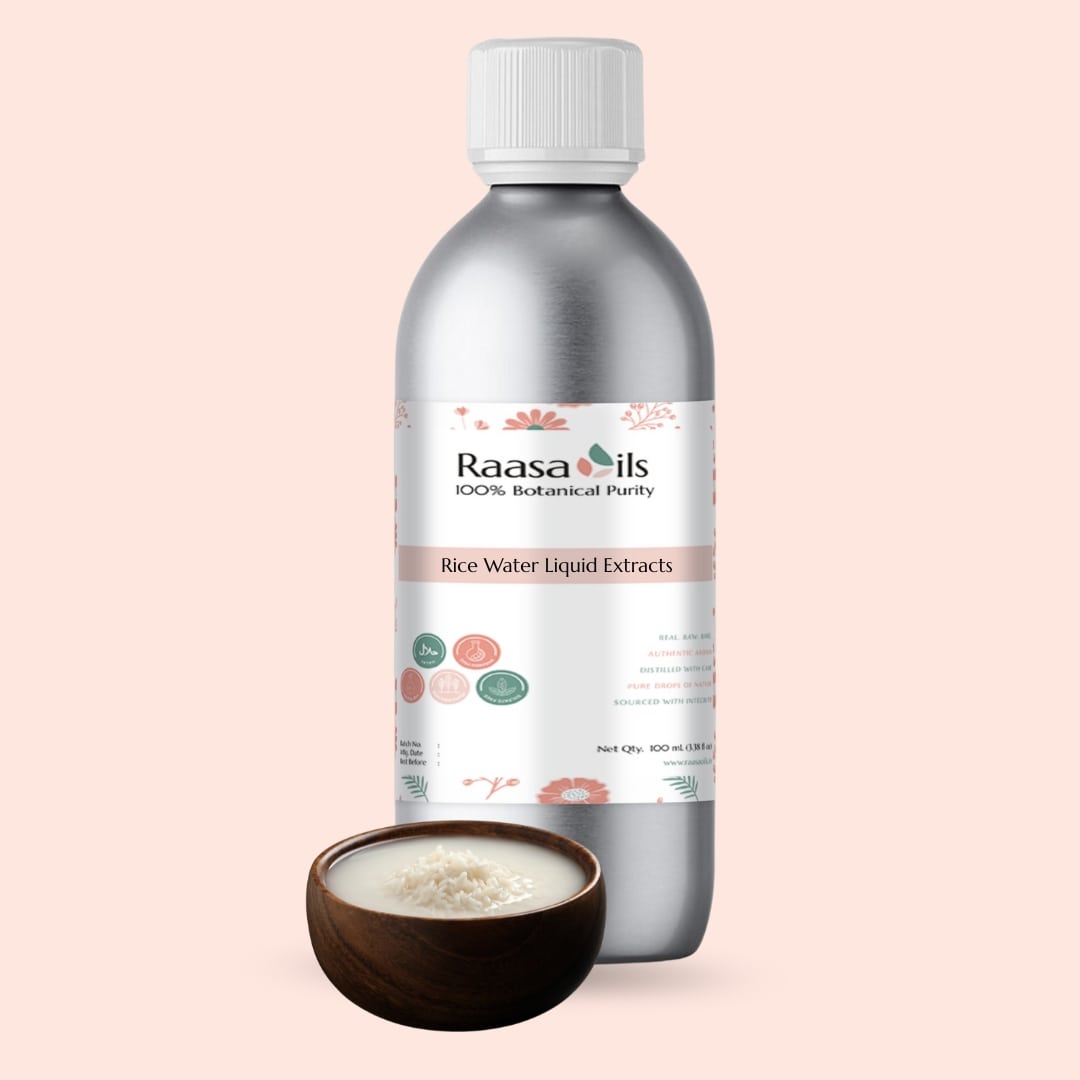 Raasa Oils bottle of Rice Water Liquid Extracts with a small bowl of rice water on a light pink background