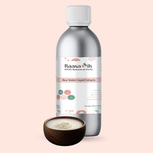 Raasa Oils bottle of Rice Water Liquid Extracts with a small bowl of rice water on a light pink background
