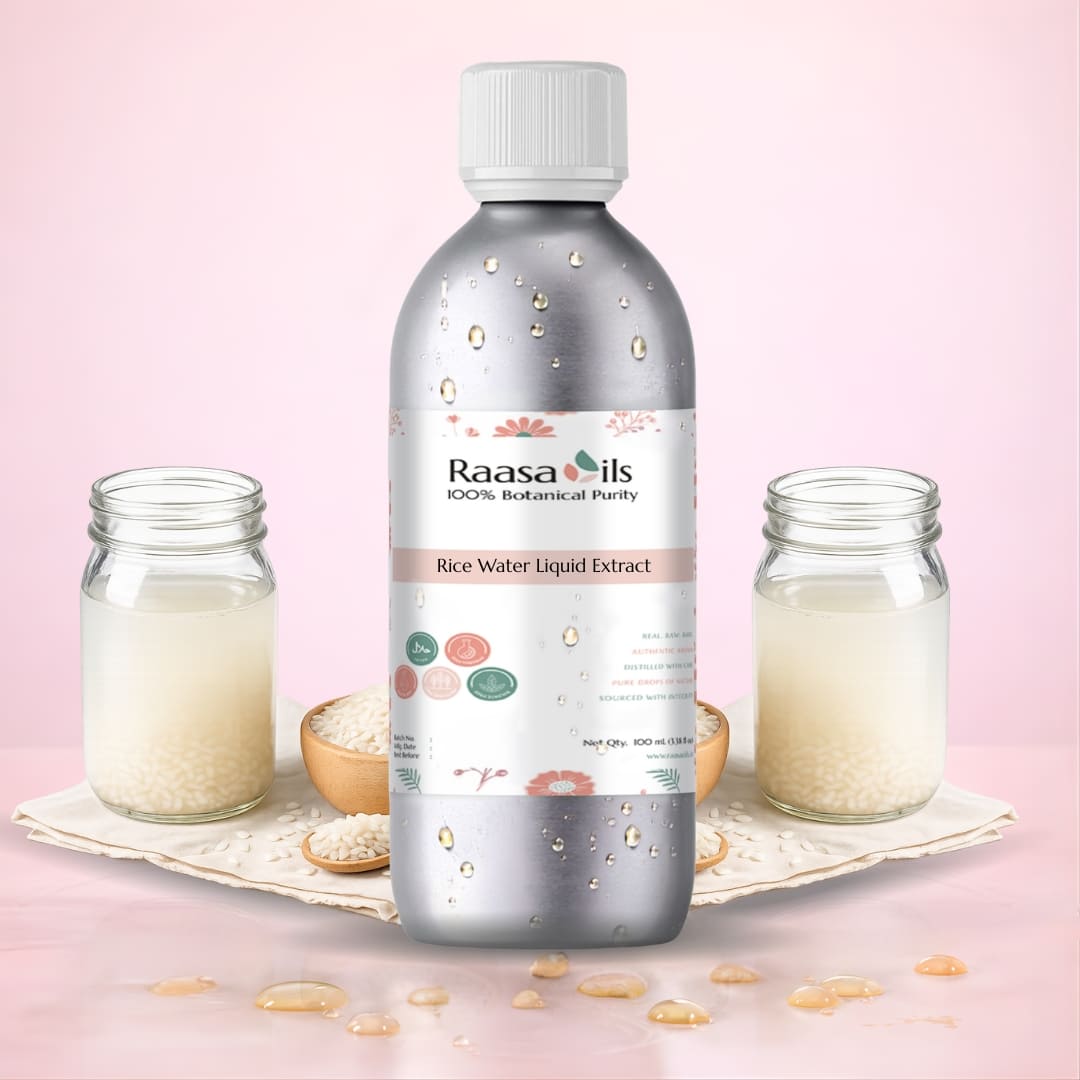 Bottle of Raasa Oils Rice Water Liquid Extract with jars and rice on a pink background