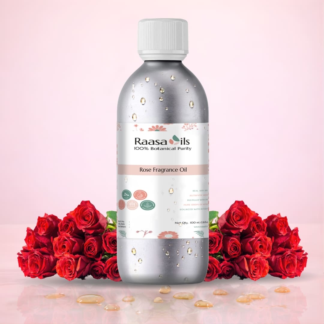 Raasa Oils Rose Fragrance Oil bottle with red roses on a pink background