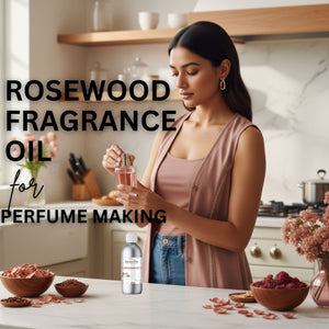 Woman in a kitchen holding a bottle of rosewood fragrance oil with text overlay.