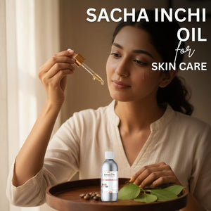 Woman using Sacha Inchi oil for skincare with a bottle and leaves on a tray.