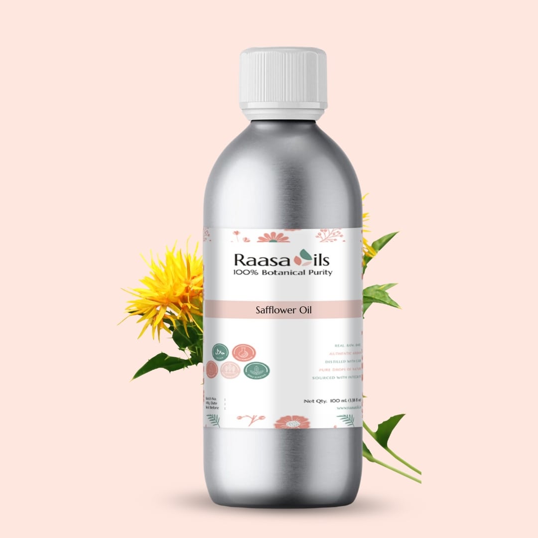 Bottle of Raasa Oils safflower oil with a pink background