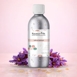 Raasa Oils bottle with saffron flowers on a pink background
