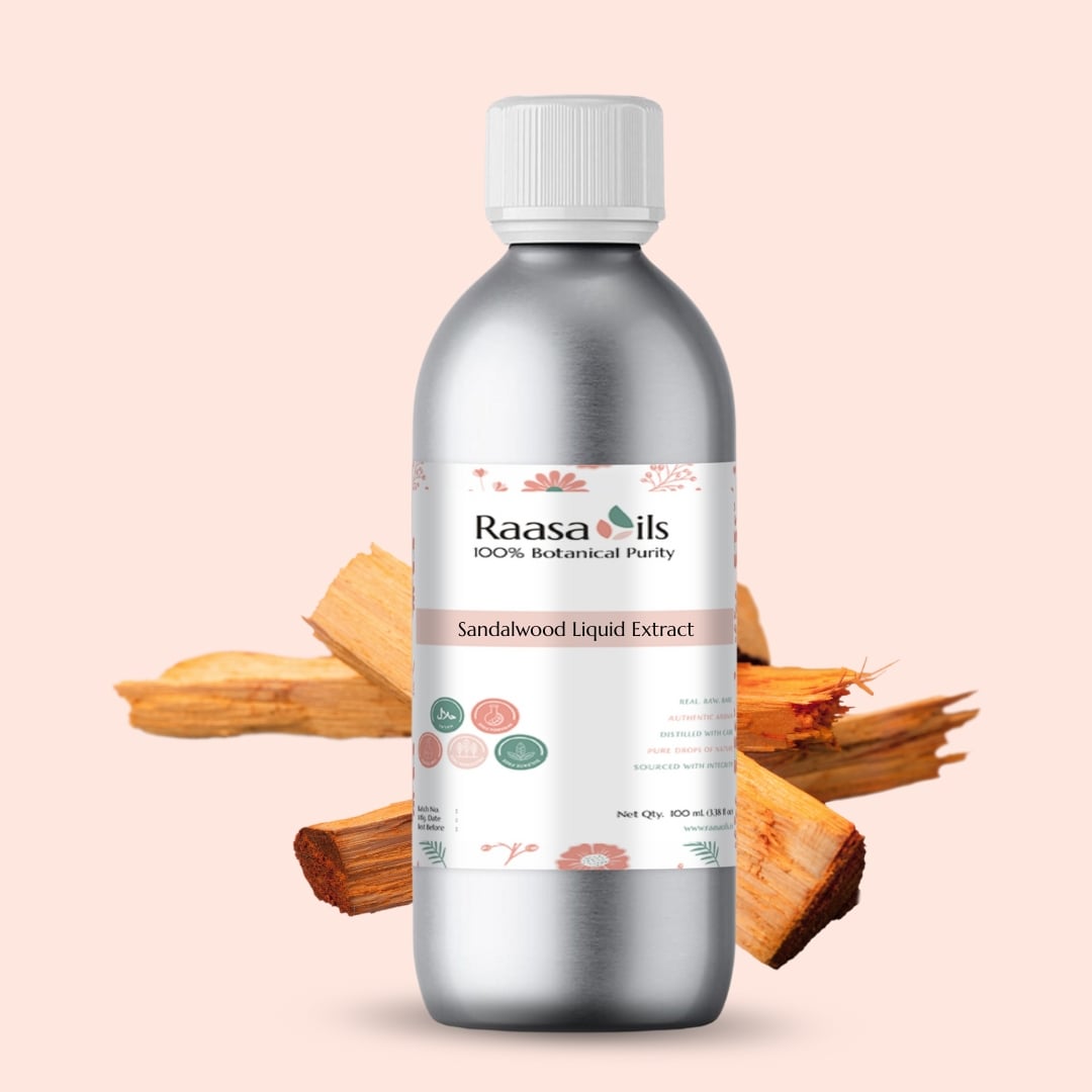Bottle of Raasa Oils Sandalwood Liquid Extract with sandalwood pieces on a beige background