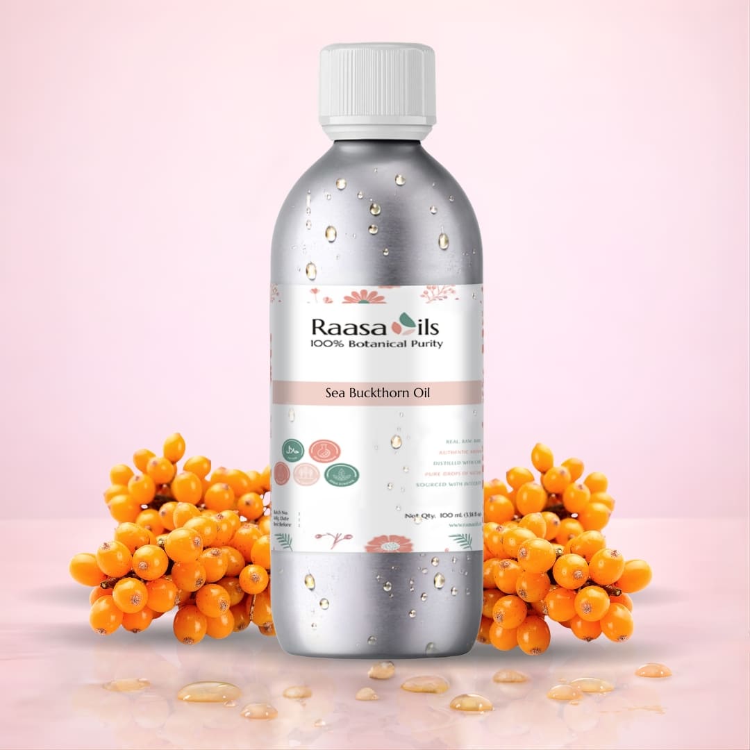 Bottle of Raasa Oils Sea Buckthorn Oil with sea buckthorn berries on a pink background