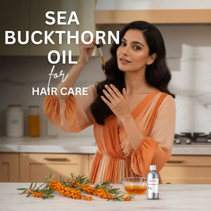 Woman applying sea buckthorn oil to her hair with text 'Sea Buckthorn Oil for Hair Care' in a kitchen setting.